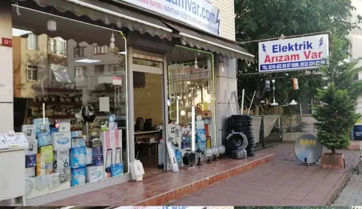 Elektrik Arızam Var dükkânının vitrini ve tabelası